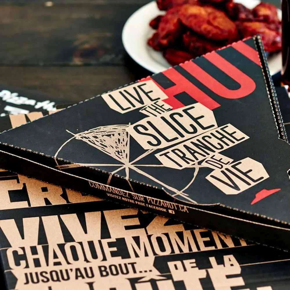 Up close photo of pizza boxes