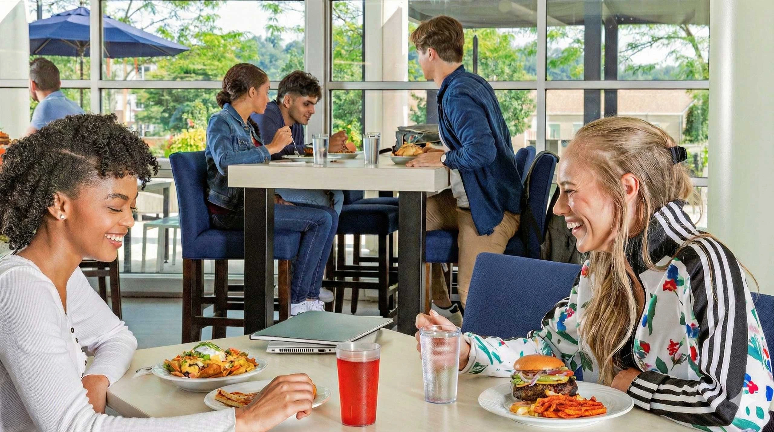 Two students enjoying a meal together